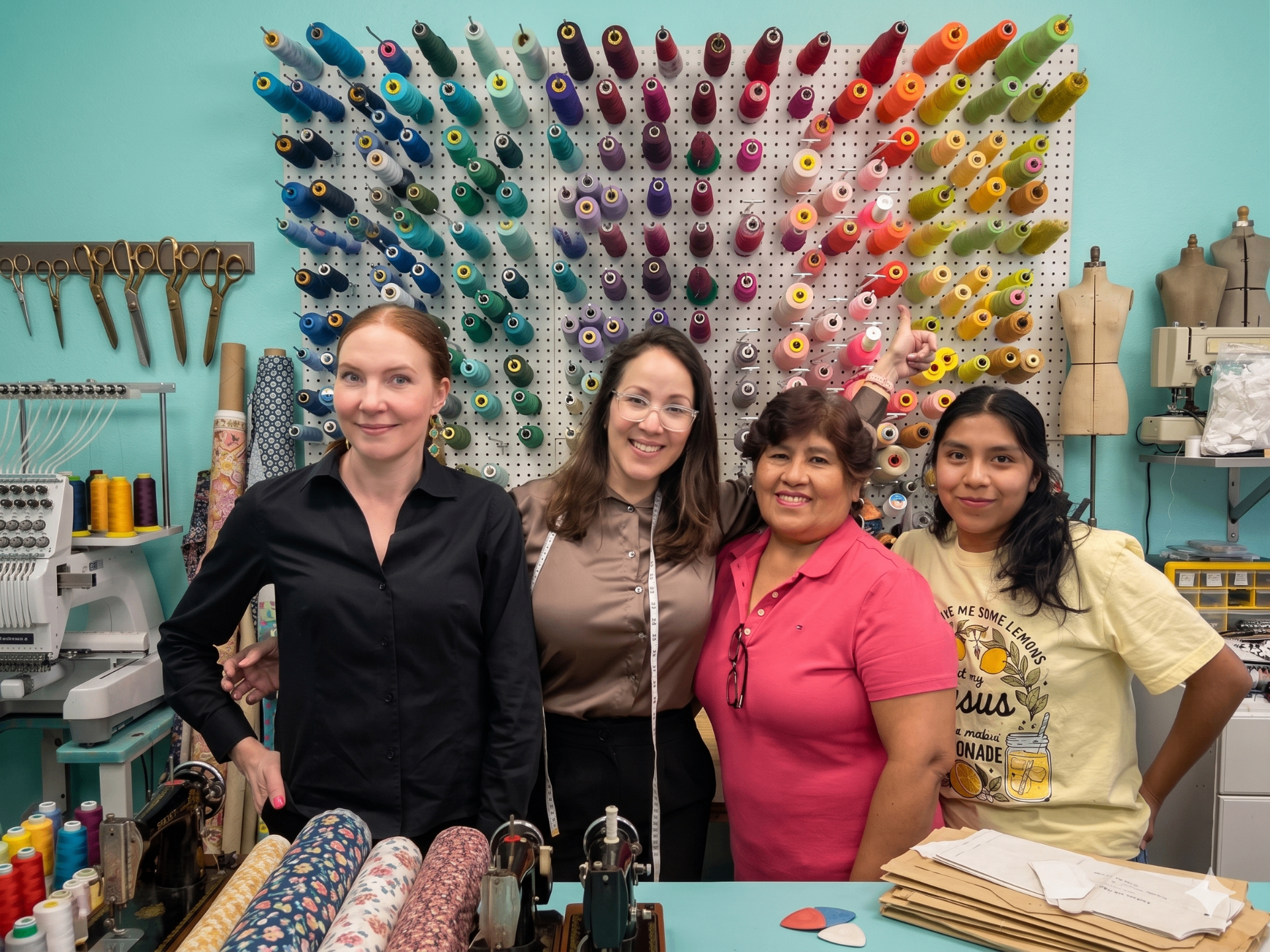 The Desert Tailor team of seamstresses in the atelier